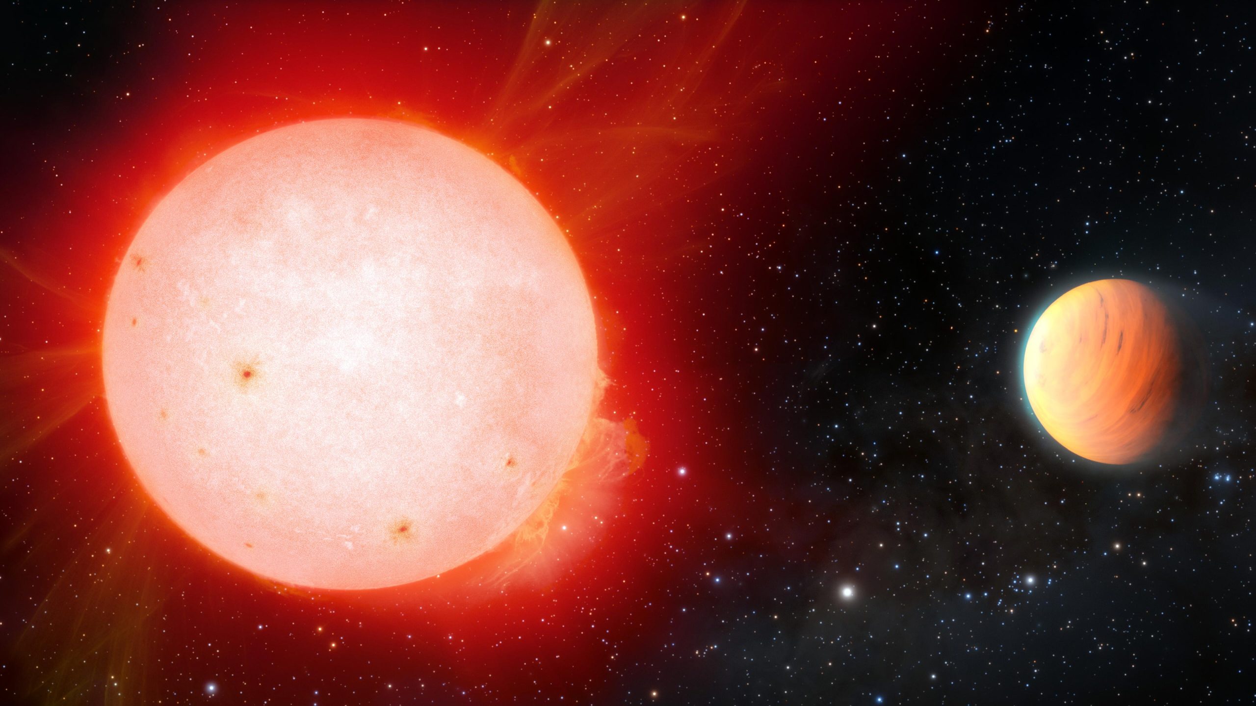 "Marshmallow" world discovered: giant, fluffy planet orbiting a red dwarf star