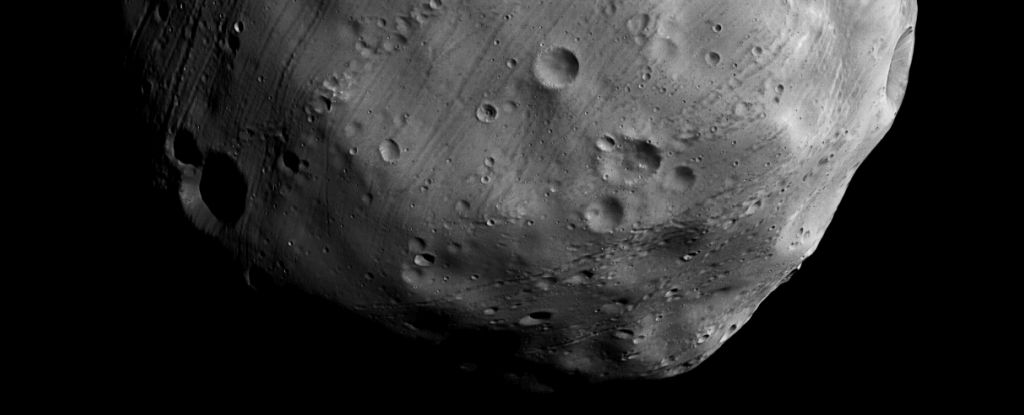 A space probe brushed past a Martian moon to peek inside