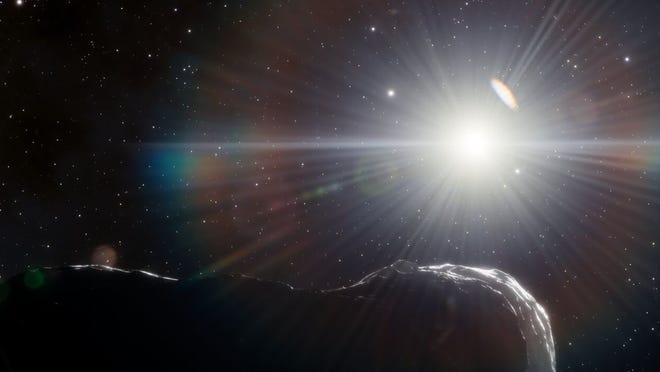 An artist's illustration captures an asteroid orbiting closer to the sun than Earth's orbit.